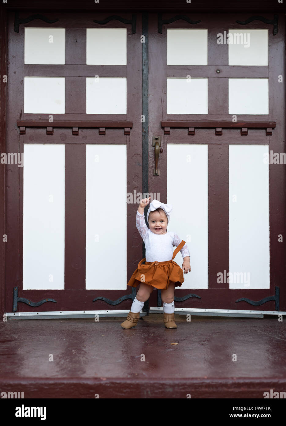 Baby mit Tür Stockfoto