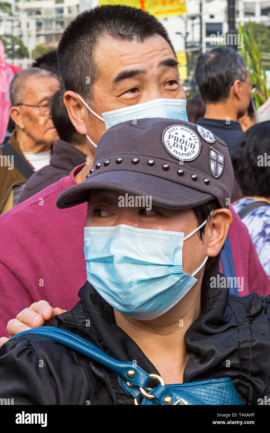 Gesichtsmasken an Neujahr Fair, Victoria Park, Hong Kong, SAR, China Stockfoto