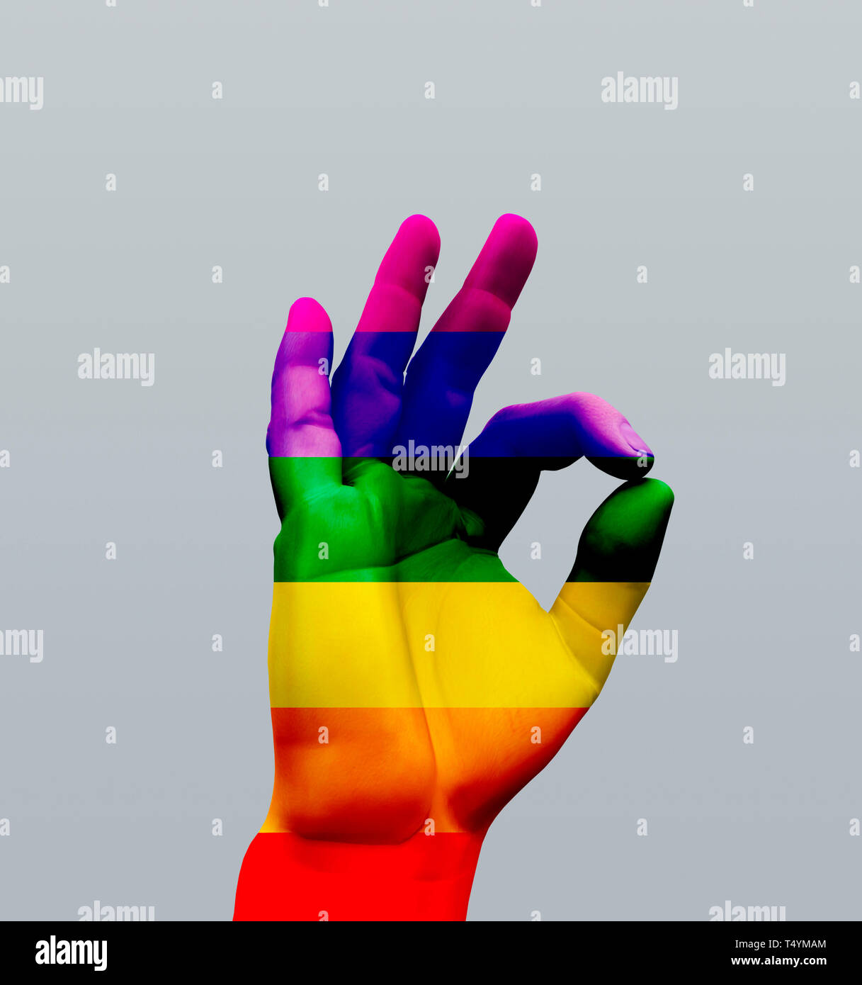 Menschliche Hand OK Zeichen, Regenbogen Stockfoto