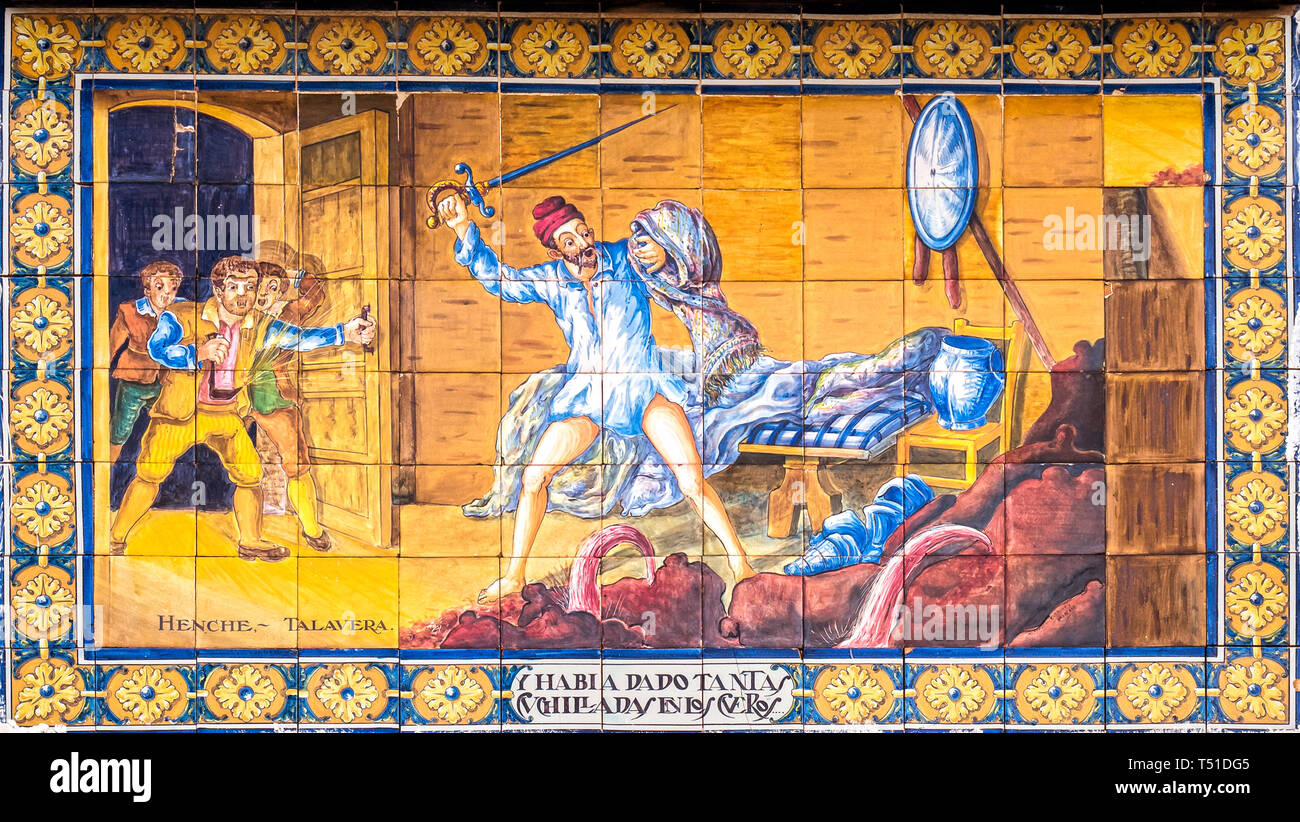 Escena de Don Quijote de la Mancha (rompiendo con la Espada los cueros de Vino) de Cerámica. La Venta de Don Quijote. El Toboso. Toledo. Castilla la M Stockfoto