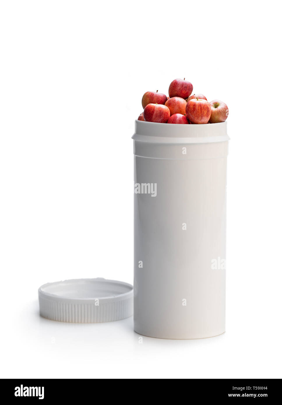 Ihre Pillen an eine frische Äpfel tauschen. Konzept der Natur vitamin Supplement aus natürlichen Früchten Stockfoto