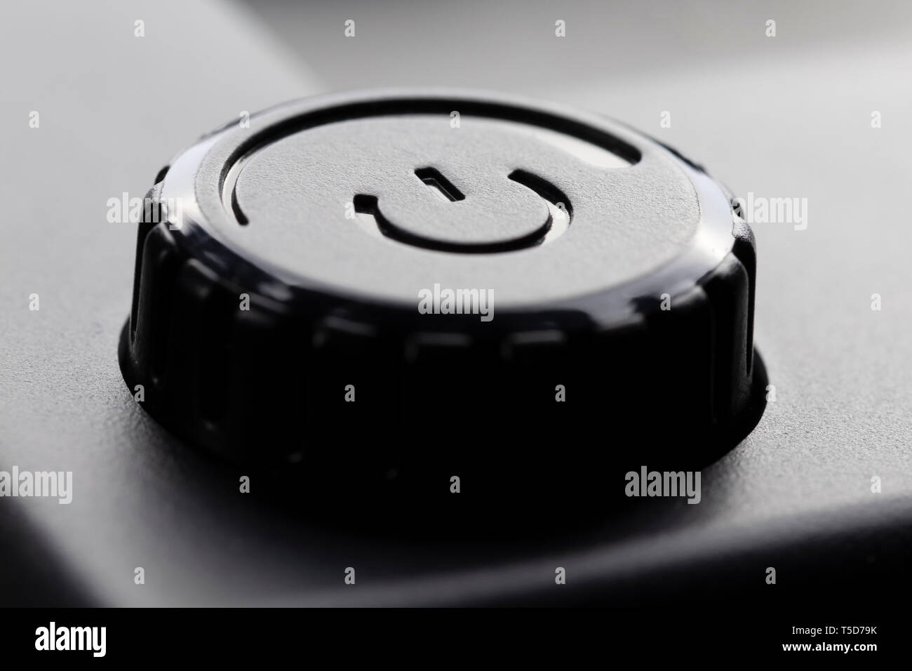 Kunststoff schwarz Power on off Knopf mit Leistungsanpassung. Close-up Stockfoto
