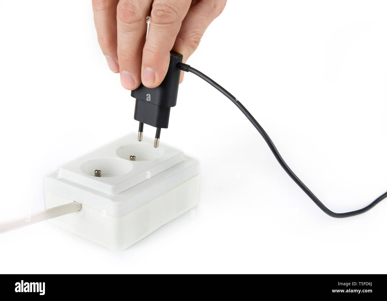 Smartphone Ladegerät Stecker in die Buchse Stockfoto