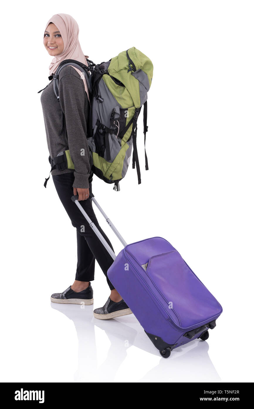 Lächelnd asiatische Frau mit suitccase Stockfoto Lächelnd asiatische Frau mit suitccase Stockfoto
