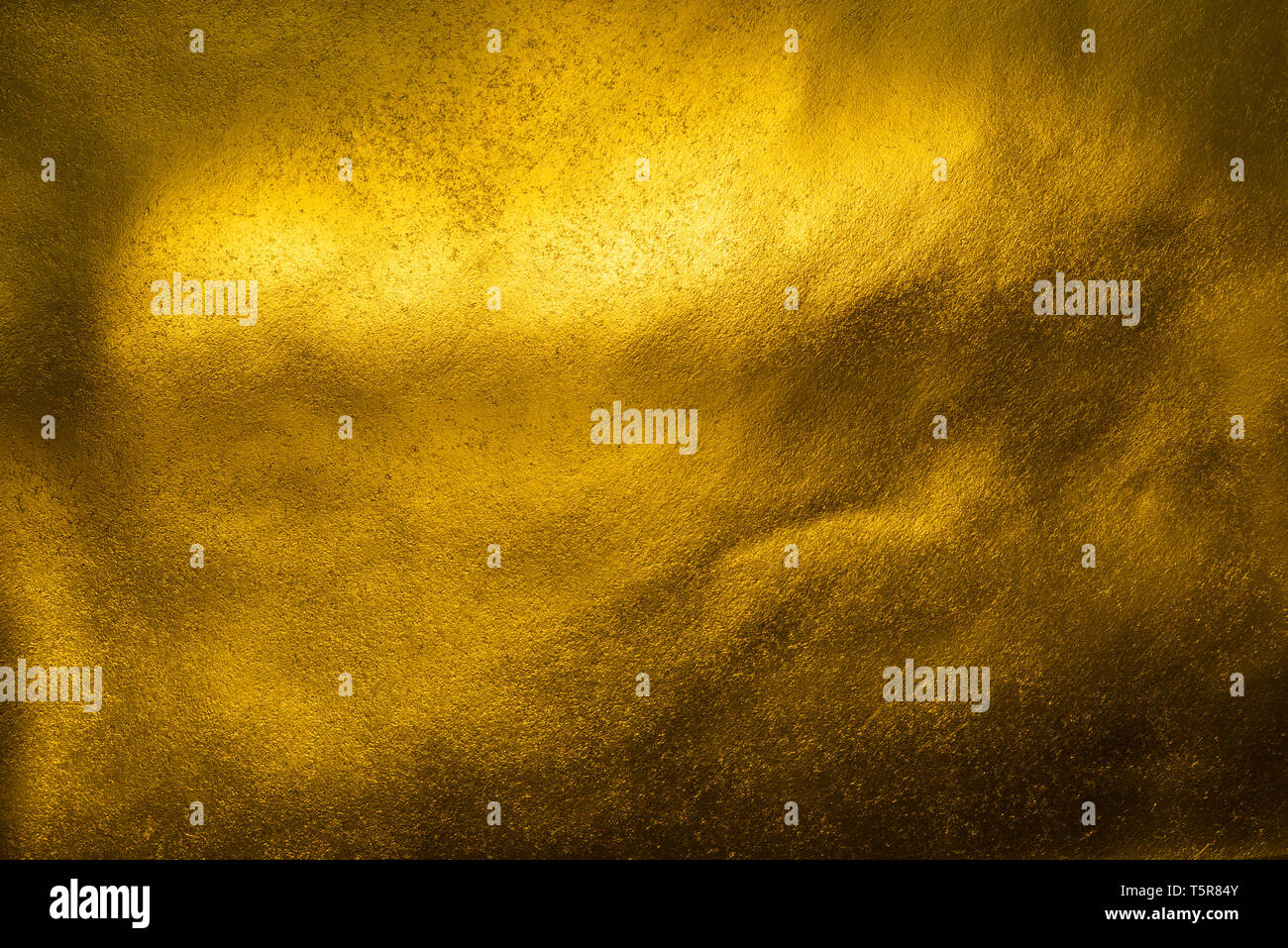Glänzend goldenen Blatt Papier Textur Hintergrund Stockfoto