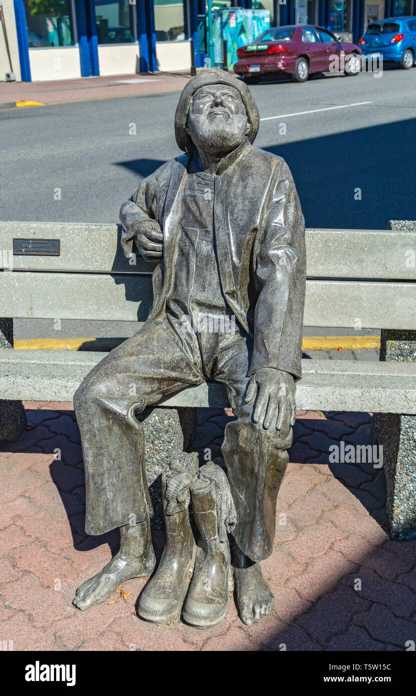 Kanada, British Columbia, Sidney, Sitzbank Menschen Statuen von artist Nathan Scott, "Alten salzigen " Stockfoto