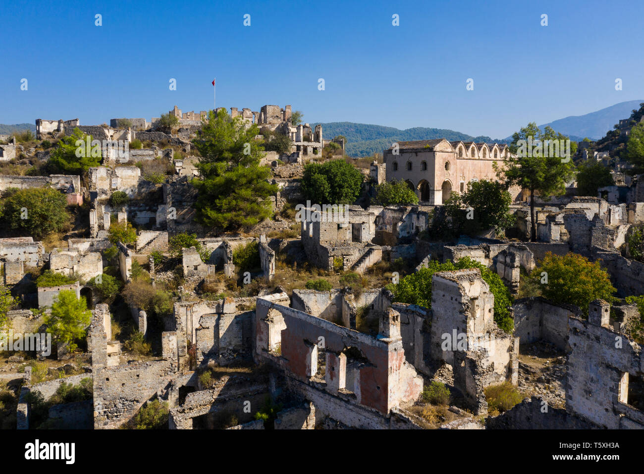 Die Türkei, Fethiye, Kayakoy (Mugla) Ghost Town, eine ehemalige griechische Kolonie und jetzt eine verlassene Stadt und Open Air Museum Stockfoto