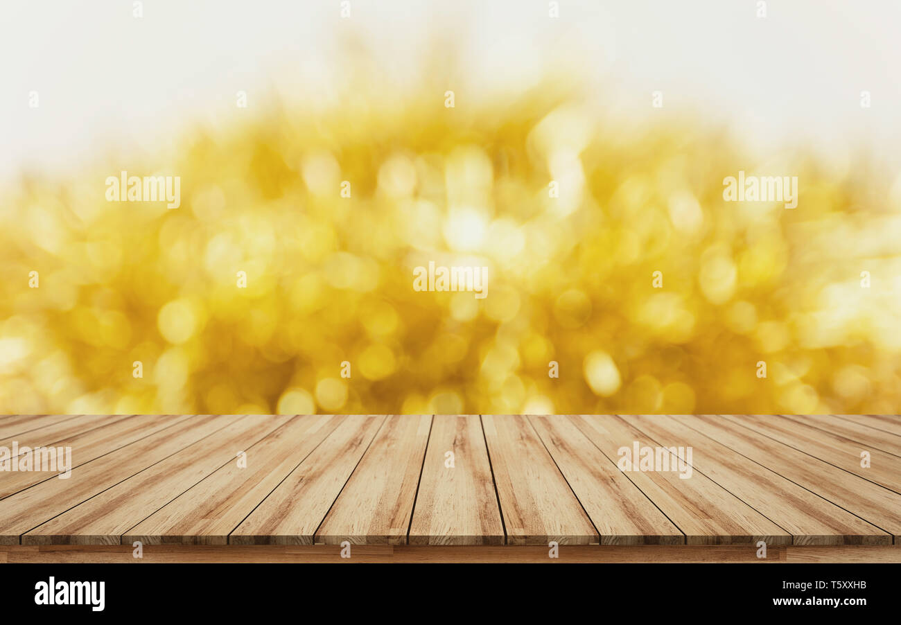 Leere Holz- Tischplatte Visual Design Layout zum Verkauf Promotion Produkte Display mit unscharfen Gold Ribbon Hintergrund Stockfoto
