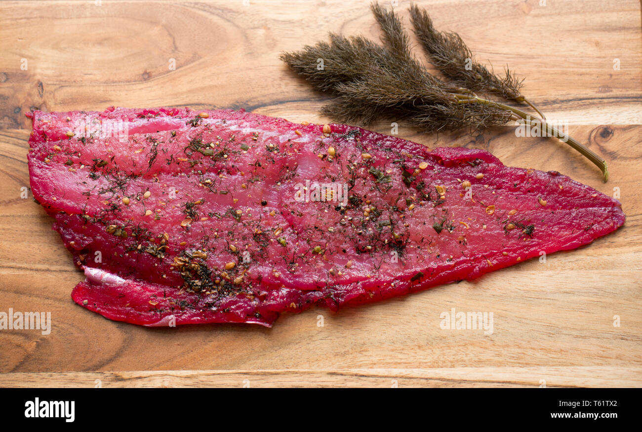 Ein seelachsfilet, pollachius pollachius, aus einem Fisch, die auf der Stange und Line in den Englischen Kanal vom Boot aus gefangen wurde. Es wurde zu Hause Stockfoto