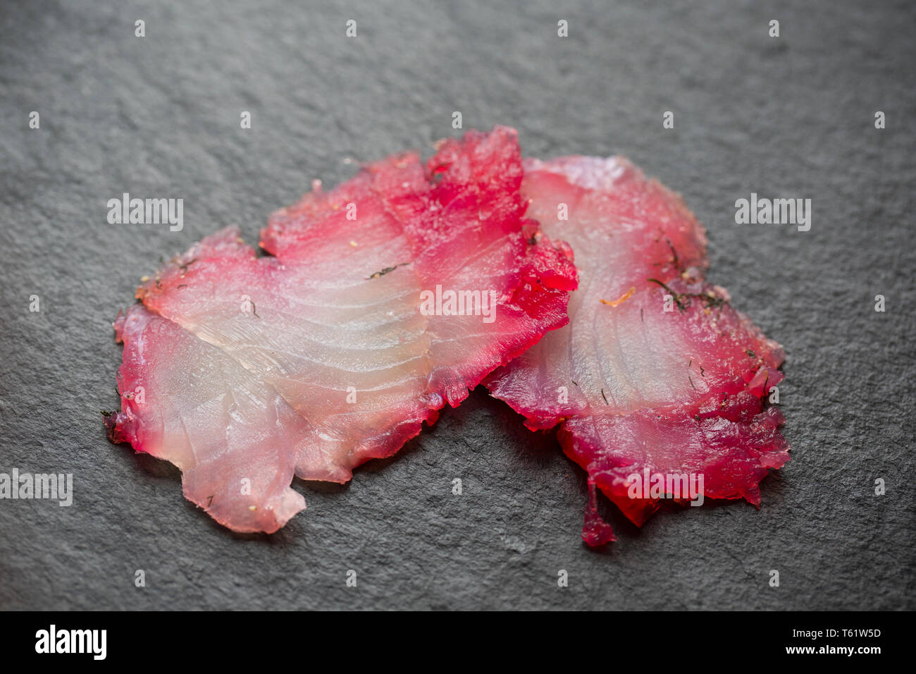 Schichten aus einem seelachsfilet, pollachius pollachius, aus einem Fisch, die auf der Stange und Line in den Englischen Kanal vom Boot aus gefangen wurde. Es ist benutzt worden Stockfoto