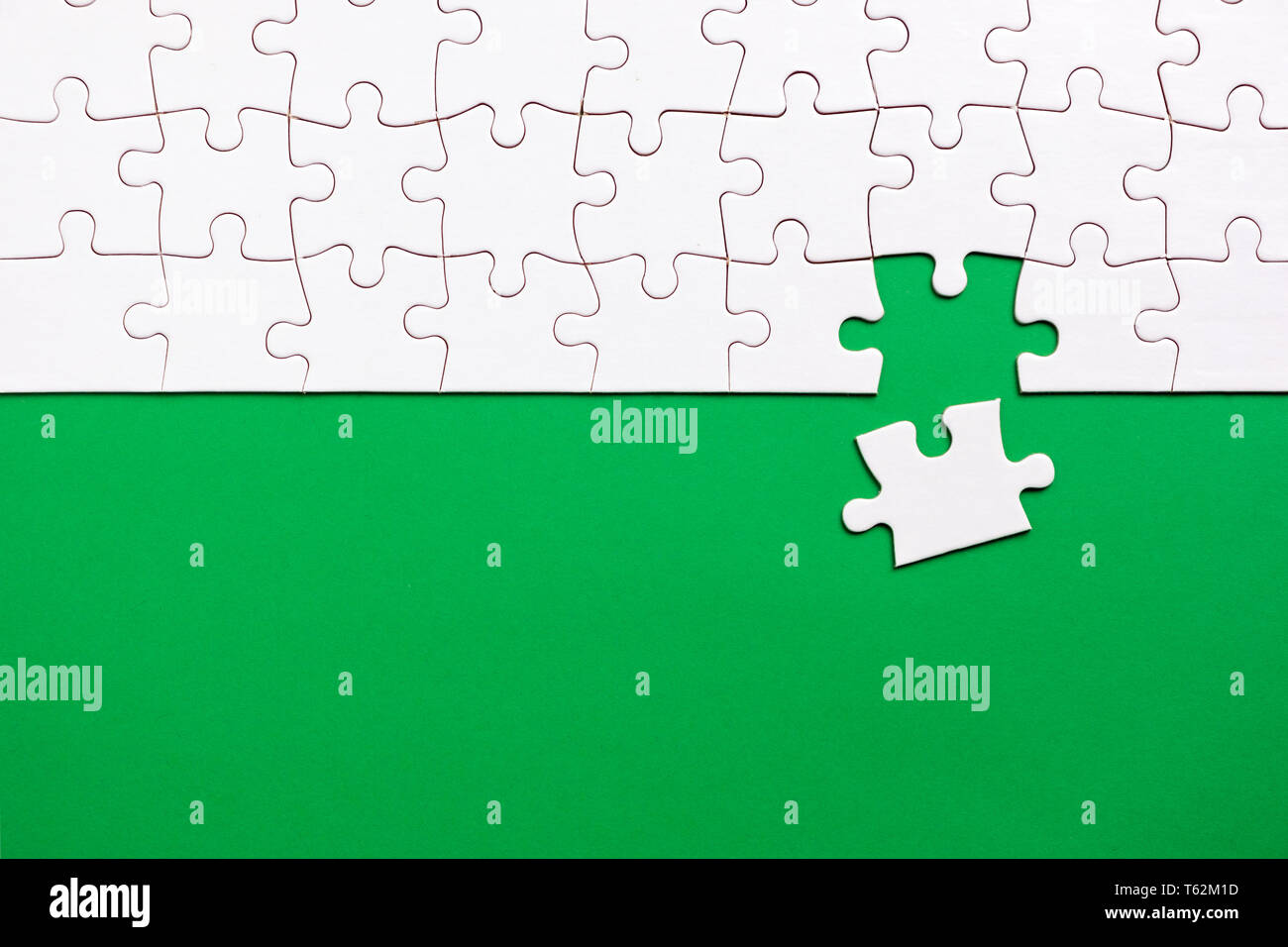 Letzte Stück weißes Puzzle um eine Mission Stockfoto