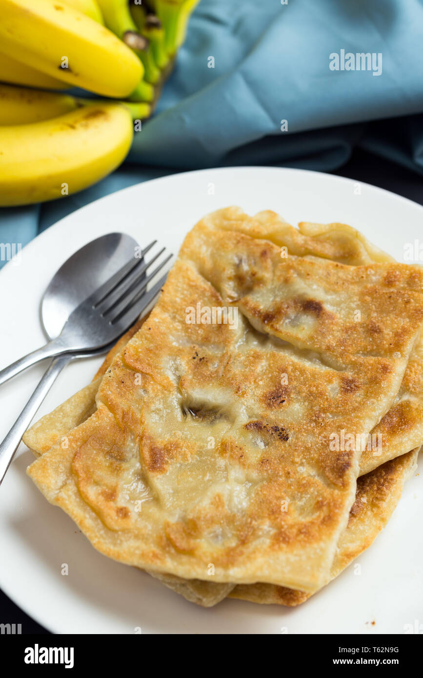 Indisches frühstück Banane paratha oder Pfannkuchen Stockfoto