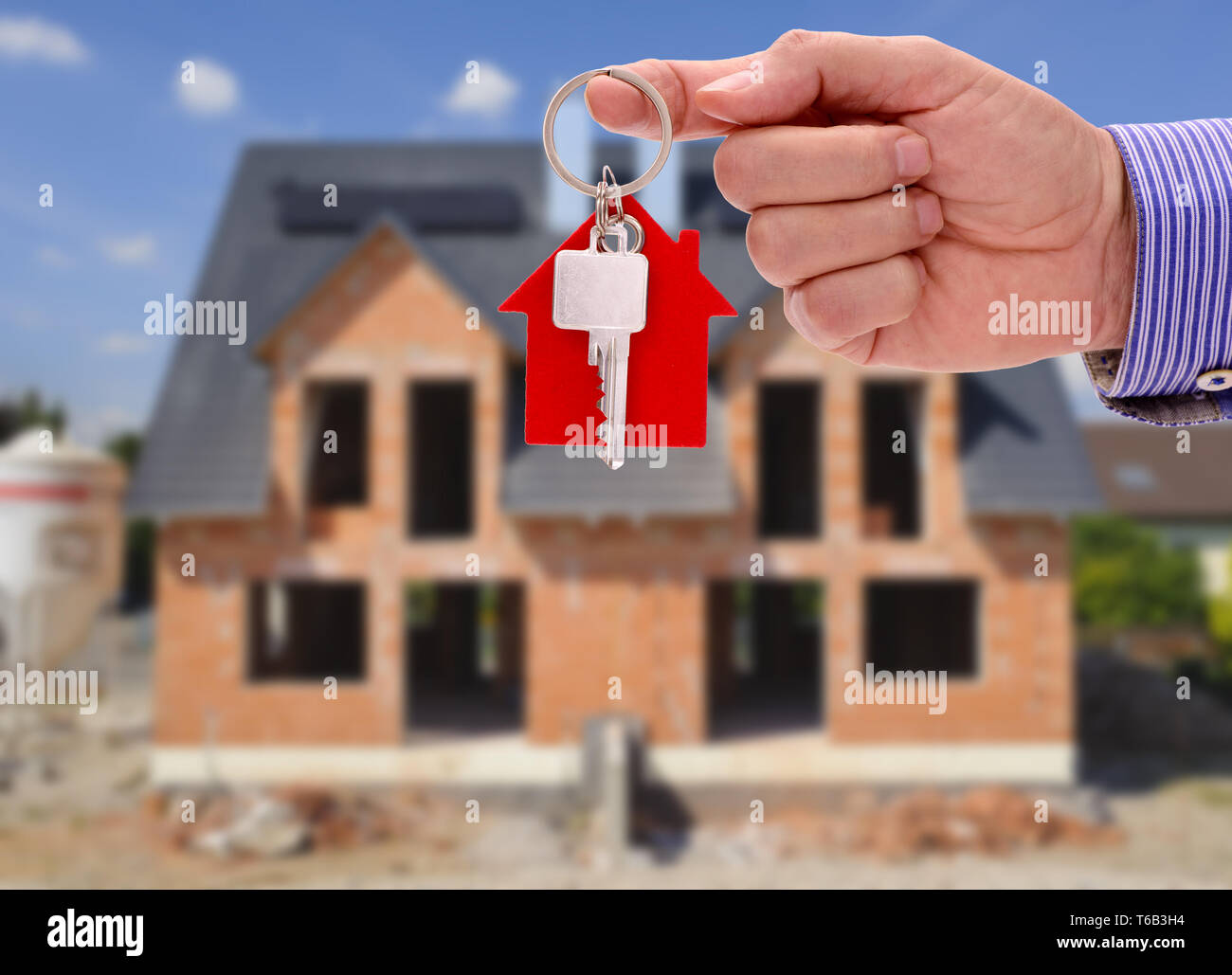 Schlüssel in der Hand für neues Haus und Immobilien Stockfoto