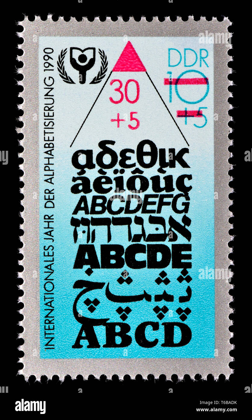Ddr-Briefmarke (1990): Internationales Jahr des Alphabets Stockfoto