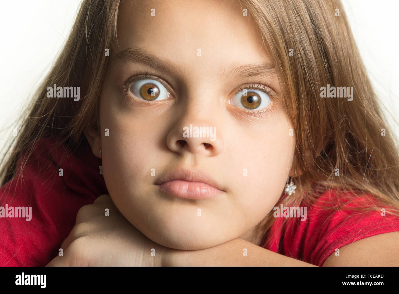 Close-up Portrait von ein junges Mädchen mit prallen Augen Stockfoto