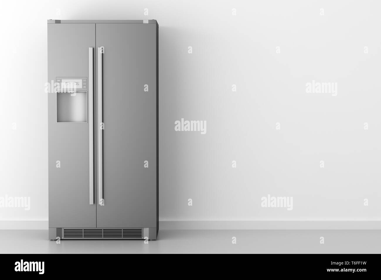 Moderne Kühlschrank vor der weißen Wand Stockfoto