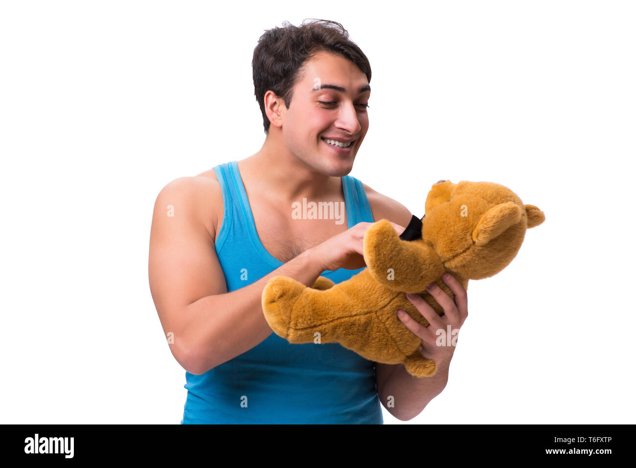 Junger Mann mit Spielzeug Tier auf weißem Hintergrund Stockfoto