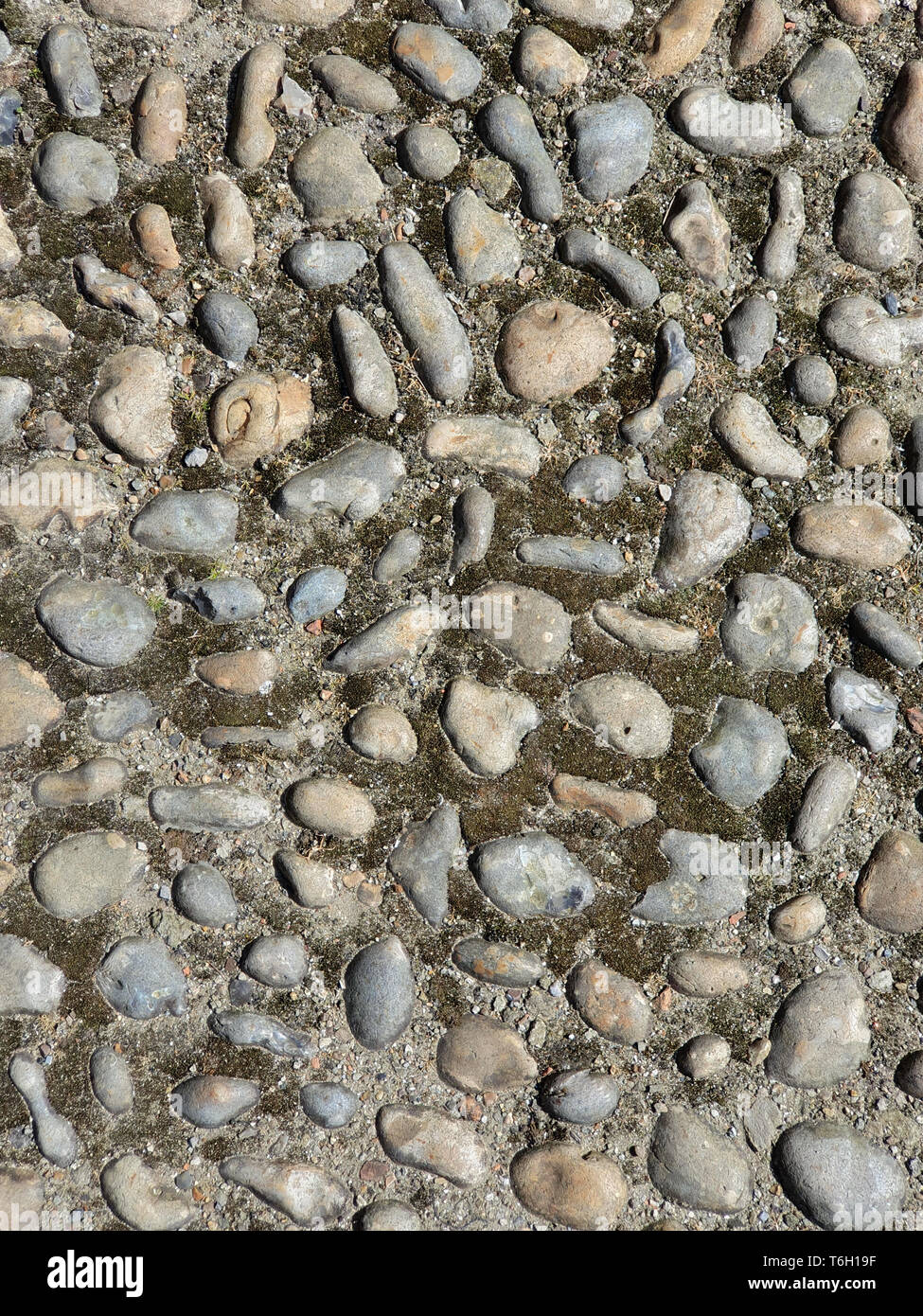 Steinboden mit alten Naturstein, Textur Hintergrund Stockfoto