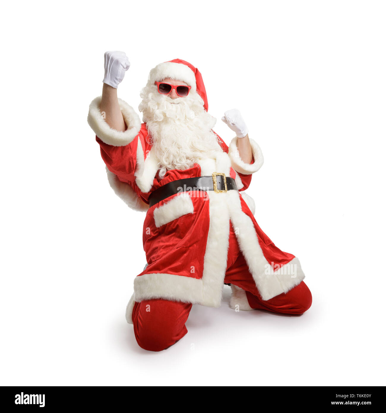 Aufgeregt Santa Claus mit Sonnenbrille Jubel Stockfoto