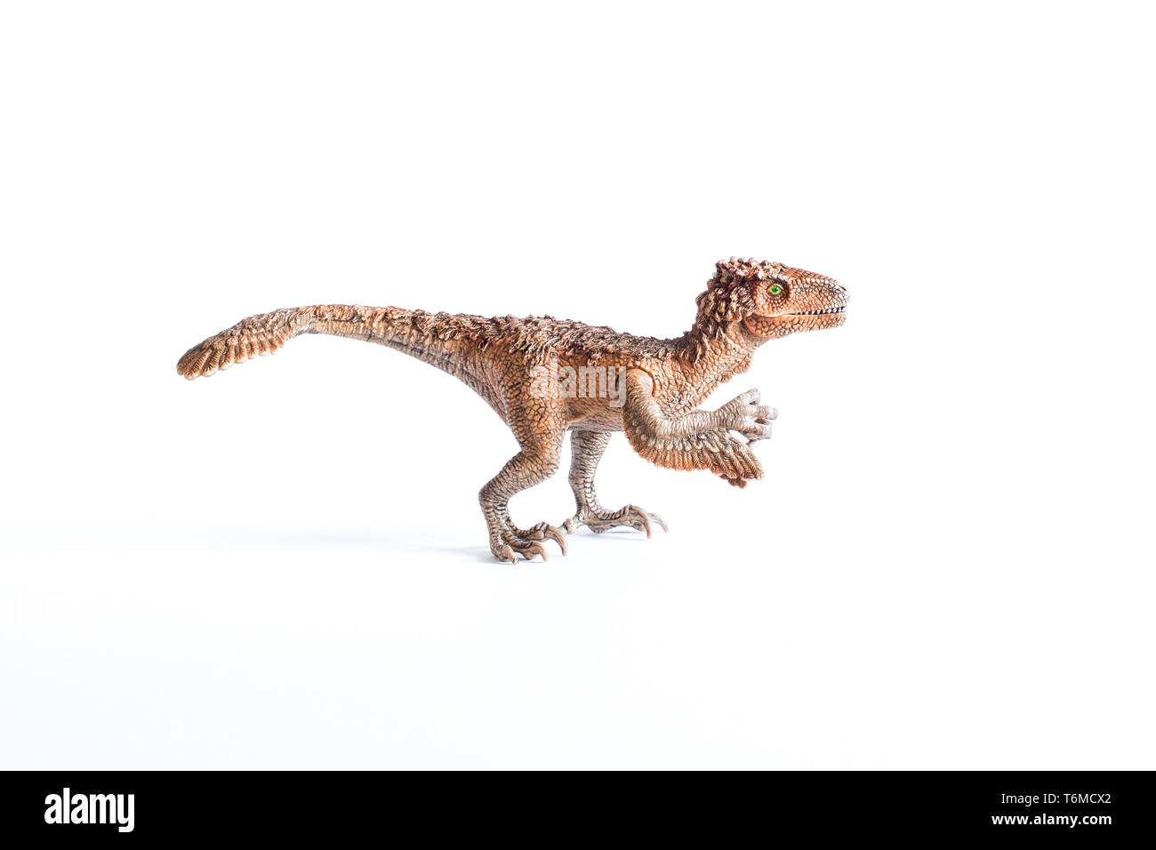 Kunststoff Dinosaurier - Spielzeug isoliert auf weißem Stockfoto