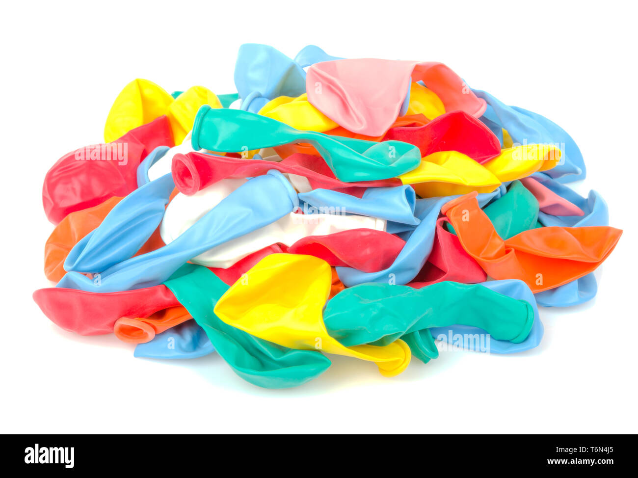 Haufen von bunten leer Luftballons, isoliert auf weiss Stockfoto