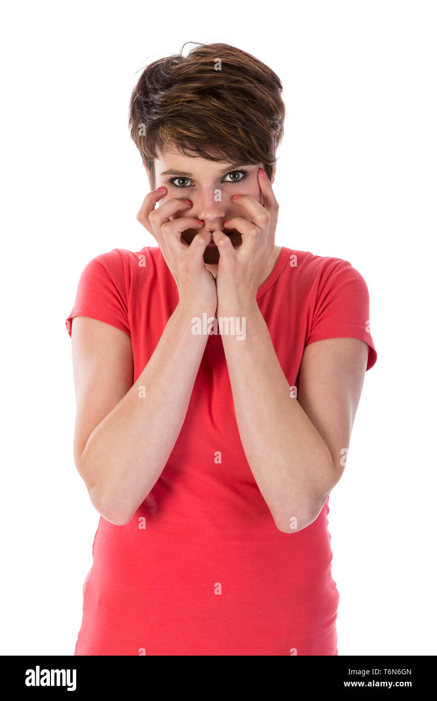 Gestörte Frau mit Händen für Gesicht Stockfoto