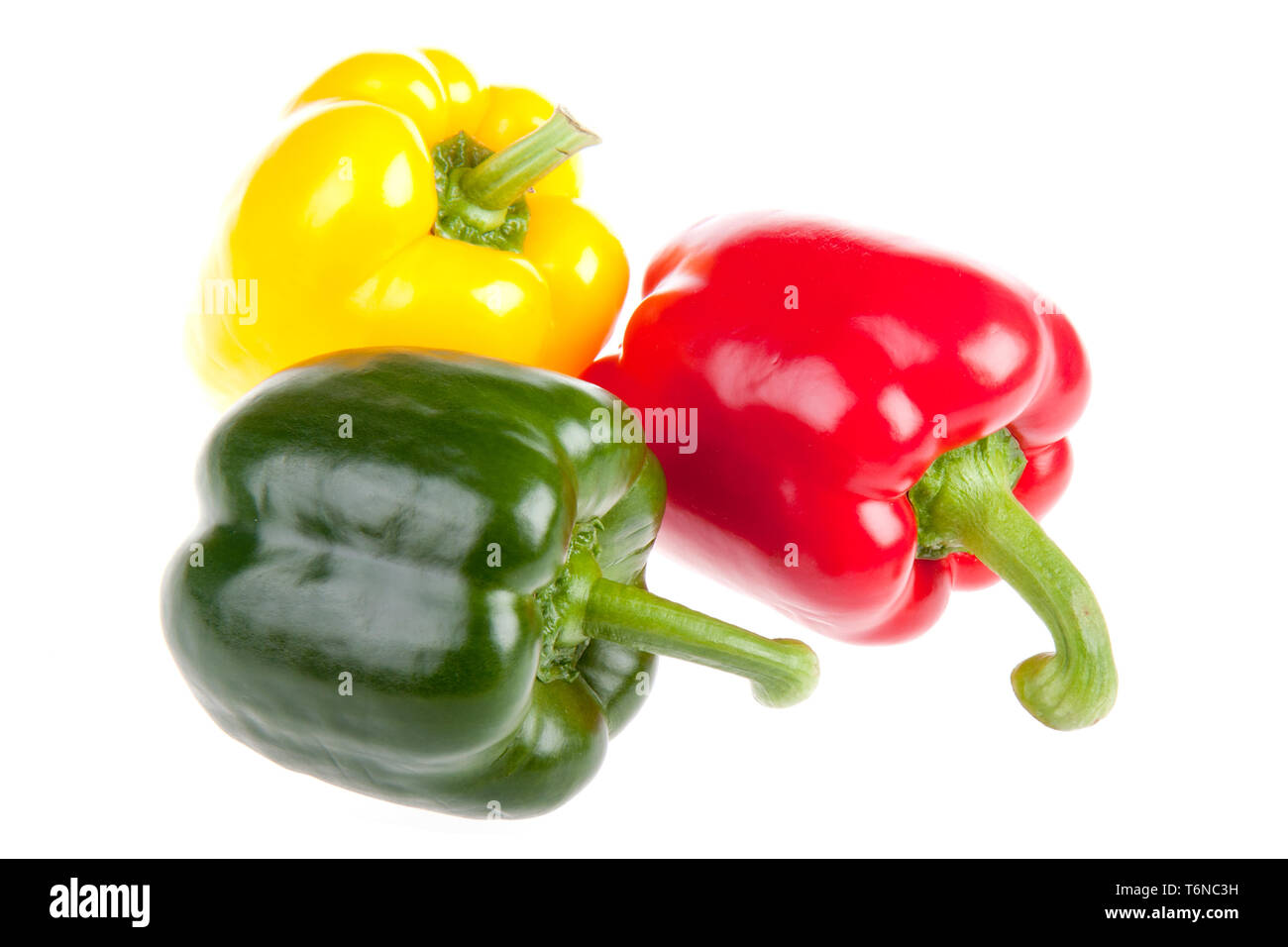 Drei rote, grüne und gelbe Paprika Stockfoto