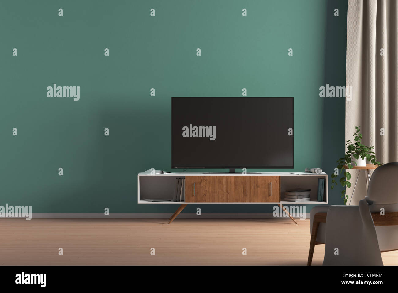 TV auf dem Schrank in modernem Wohnzimmer auf türkisfarbenem Hintergrund mit leerem Raum Stockfoto