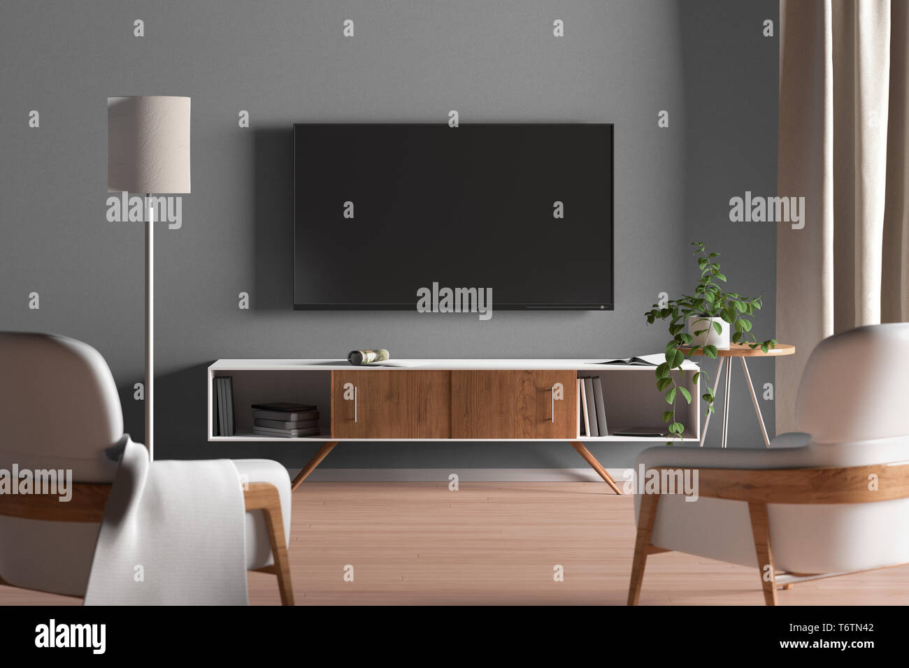 Fernseher an der grauen Wand im modernen Wohnzimmer Stockfoto