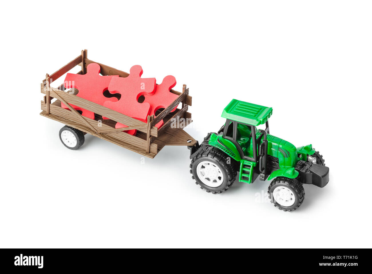 Spielzeug Traktor mit Puzzle Stockfoto
