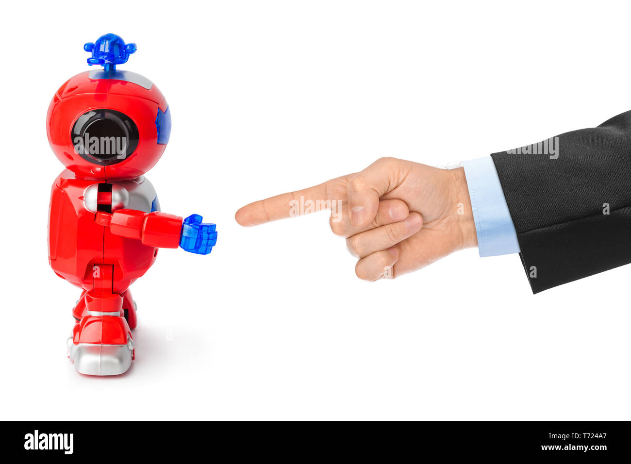 Spielzeug Roboter und Hand Stockfoto