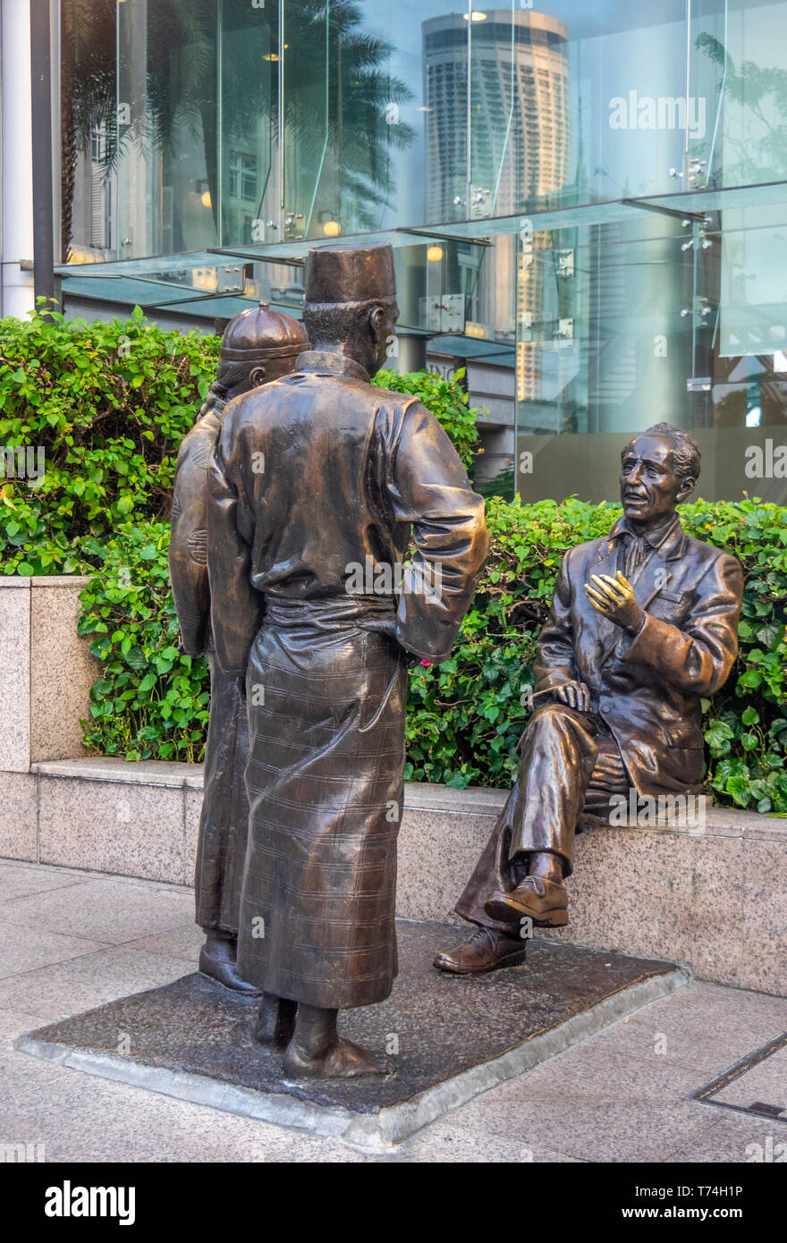 Bronze Skulptur der Fluss Kaufleute von Aw-T-Stück Hong Bildhauer entlang des Singapore River in der Innenstadt von Singapur. Stockfoto