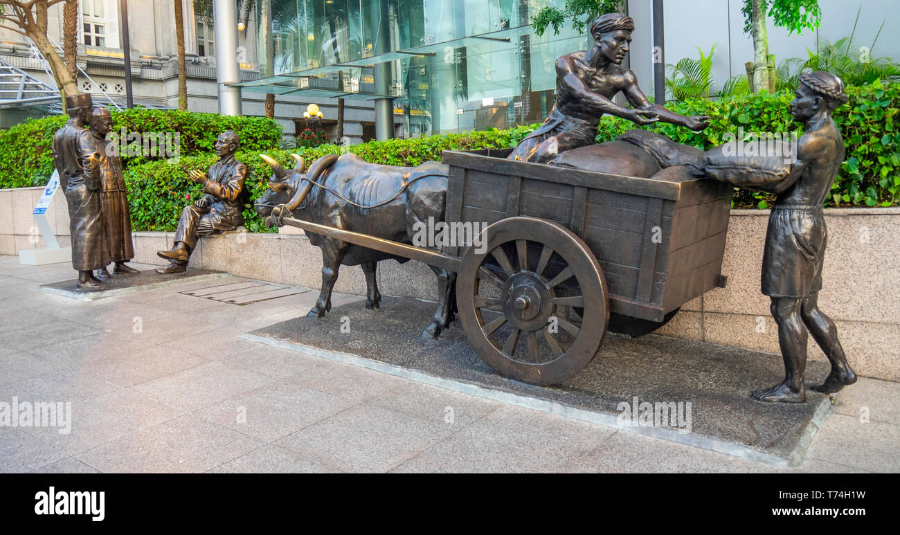 Bronze Skulptur der Fluss Kaufleute von Aw-T-Stück Hong Bildhauer entlang des Singapore River in der Innenstadt von Singapur. Stockfoto