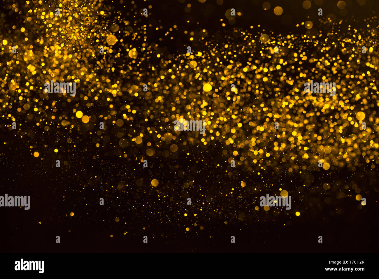 Gold Konfetti Staub regen Abstrakt Hintergrund Stockfoto