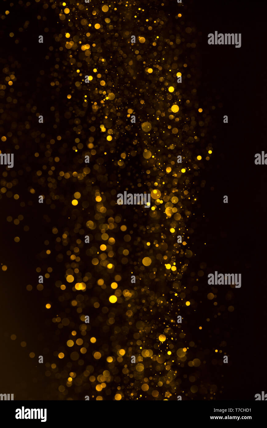 Gelb glitter glänzend abstrakte Lichter flow Hintergrund Stockfoto