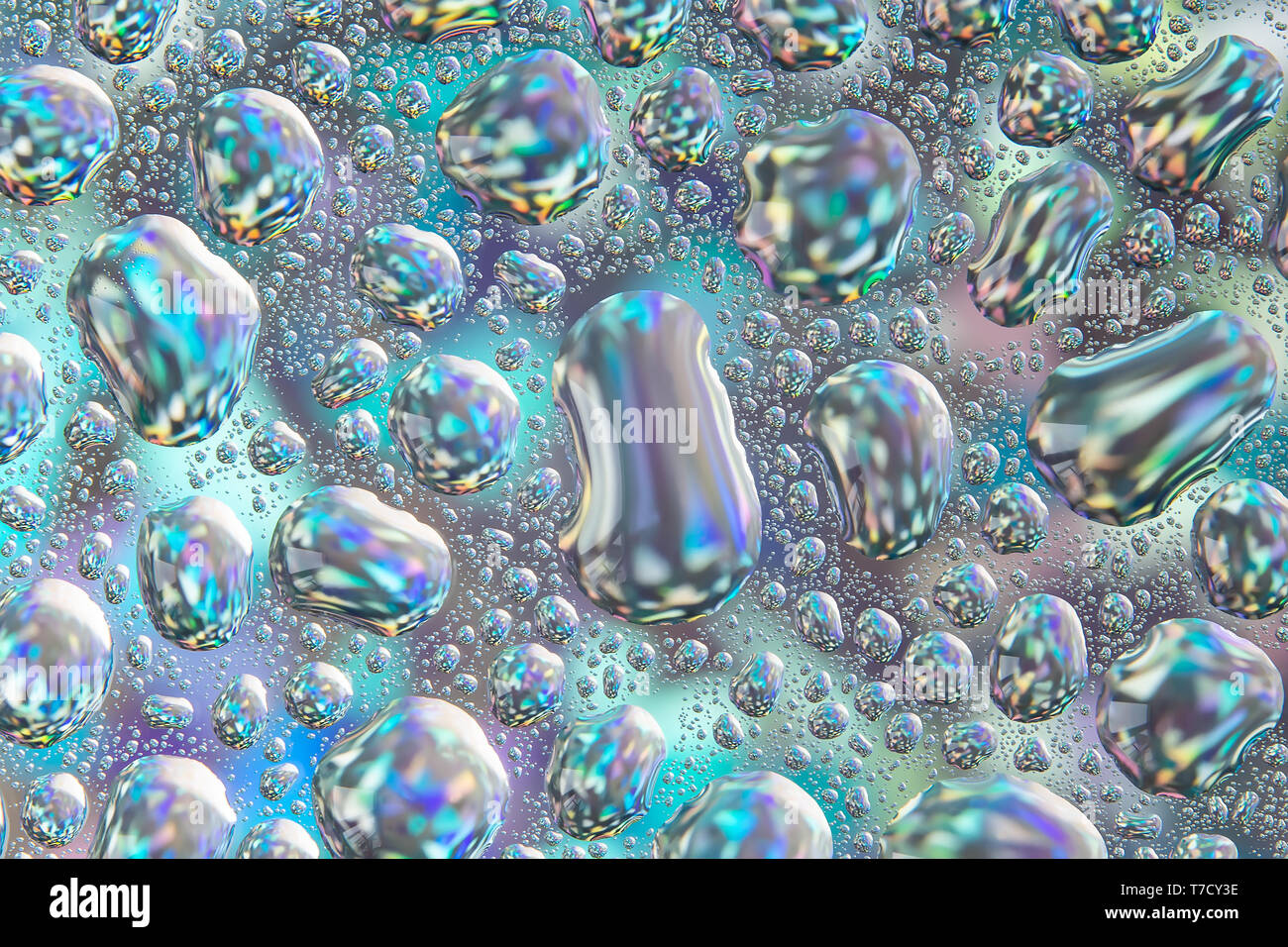 Zusammenfassung Hintergrund von Wassertropfen auf Glas, durch ein Multi-farbigen Hintergrund beleuchtet. Stockfoto