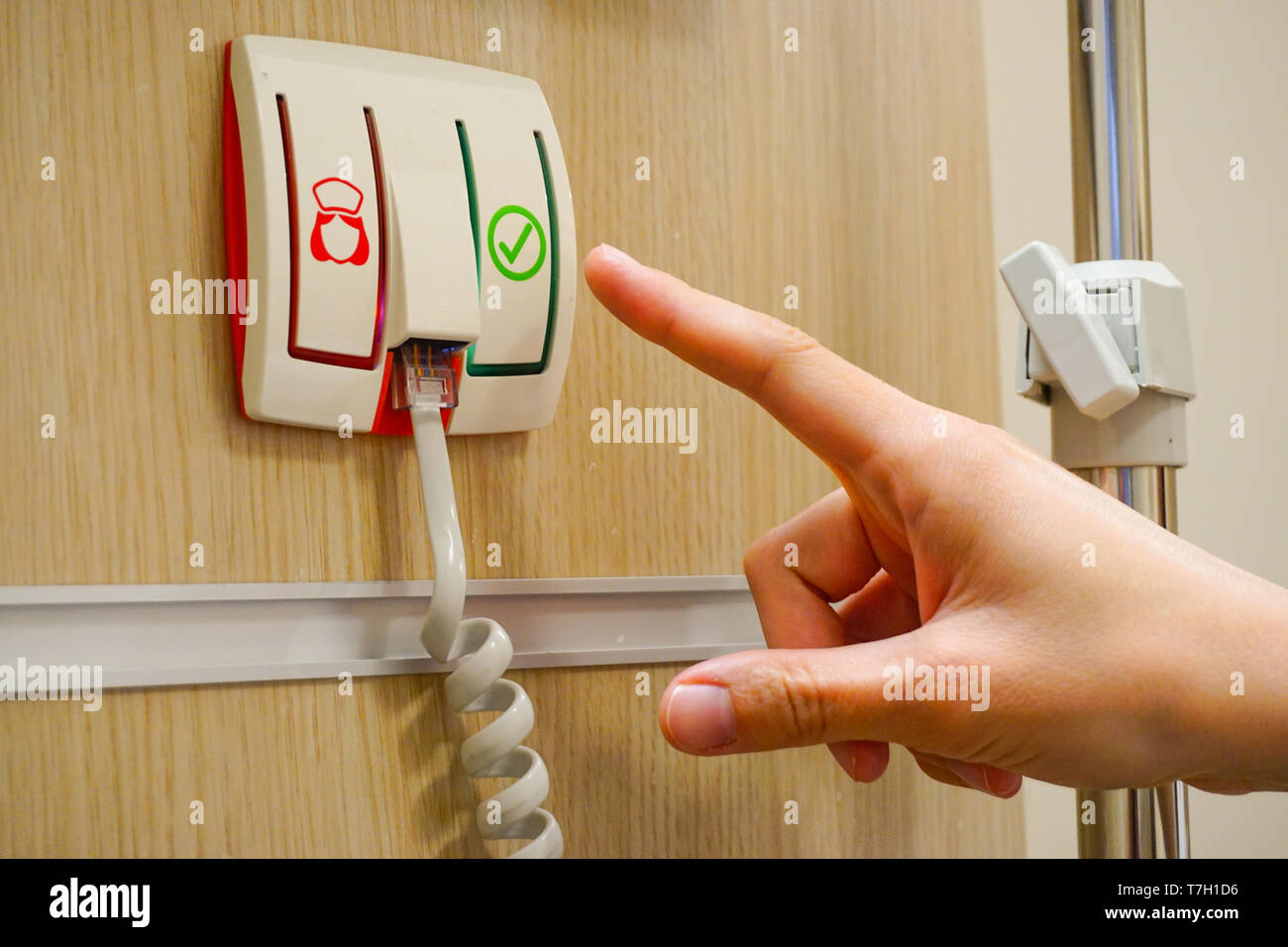 Notruftaste am Krankenhaus Zimmer Stockfoto