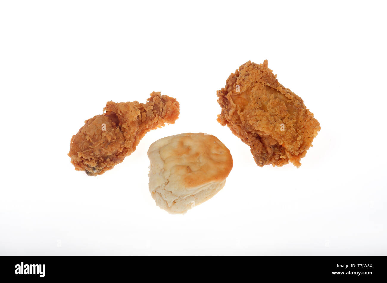 KFC knusprig gebratenes Huhn drumstick, Oberschenkel und Keks auf weißem Hintergrund Stockfoto