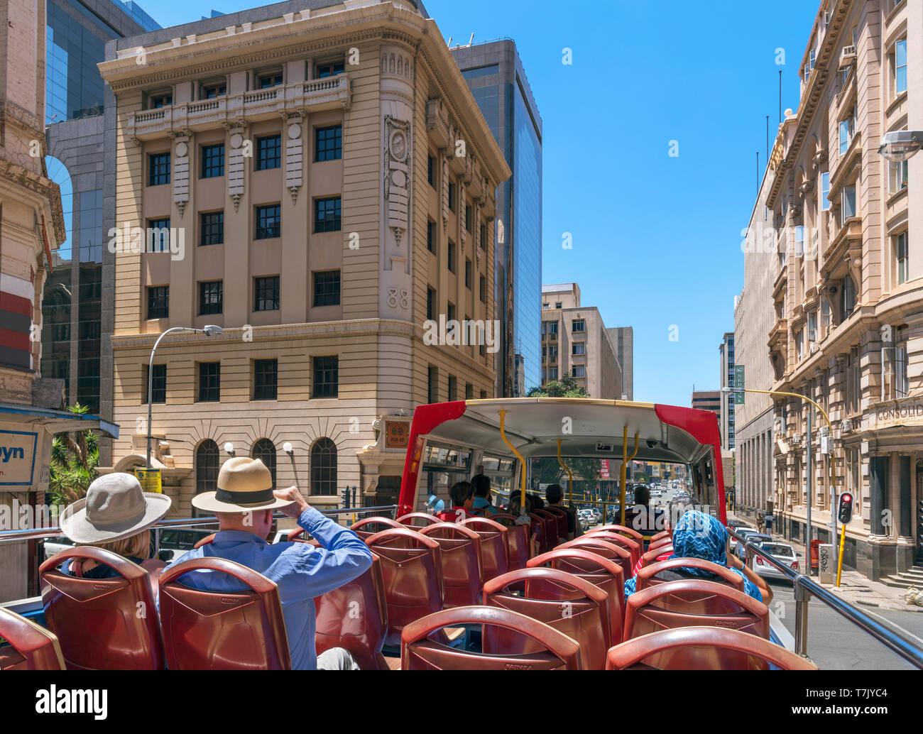 Touristen auf einer Stadtrundfahrt mit dem Bus im Central Business District (CBD), Johannesburg, Südafrika Stockfoto