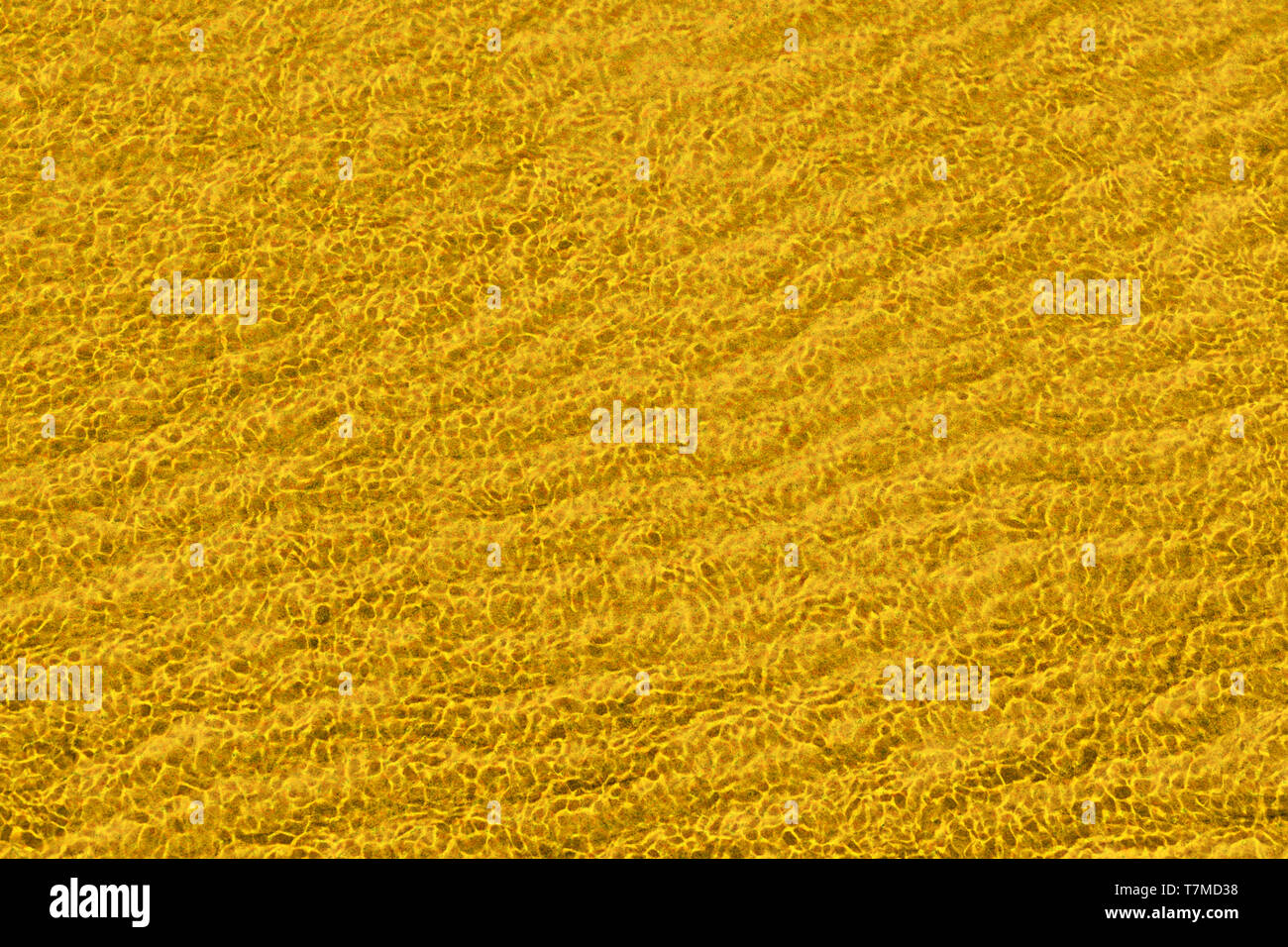 Gelbe abstrakte winkte Oberfläche schließen. Textur und Hintergrund Stockfoto