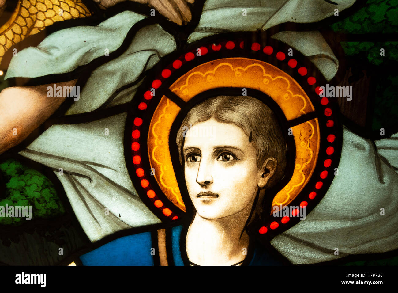 Detail eines Glasfenster. Ein Haloed Gesicht Stockfoto
