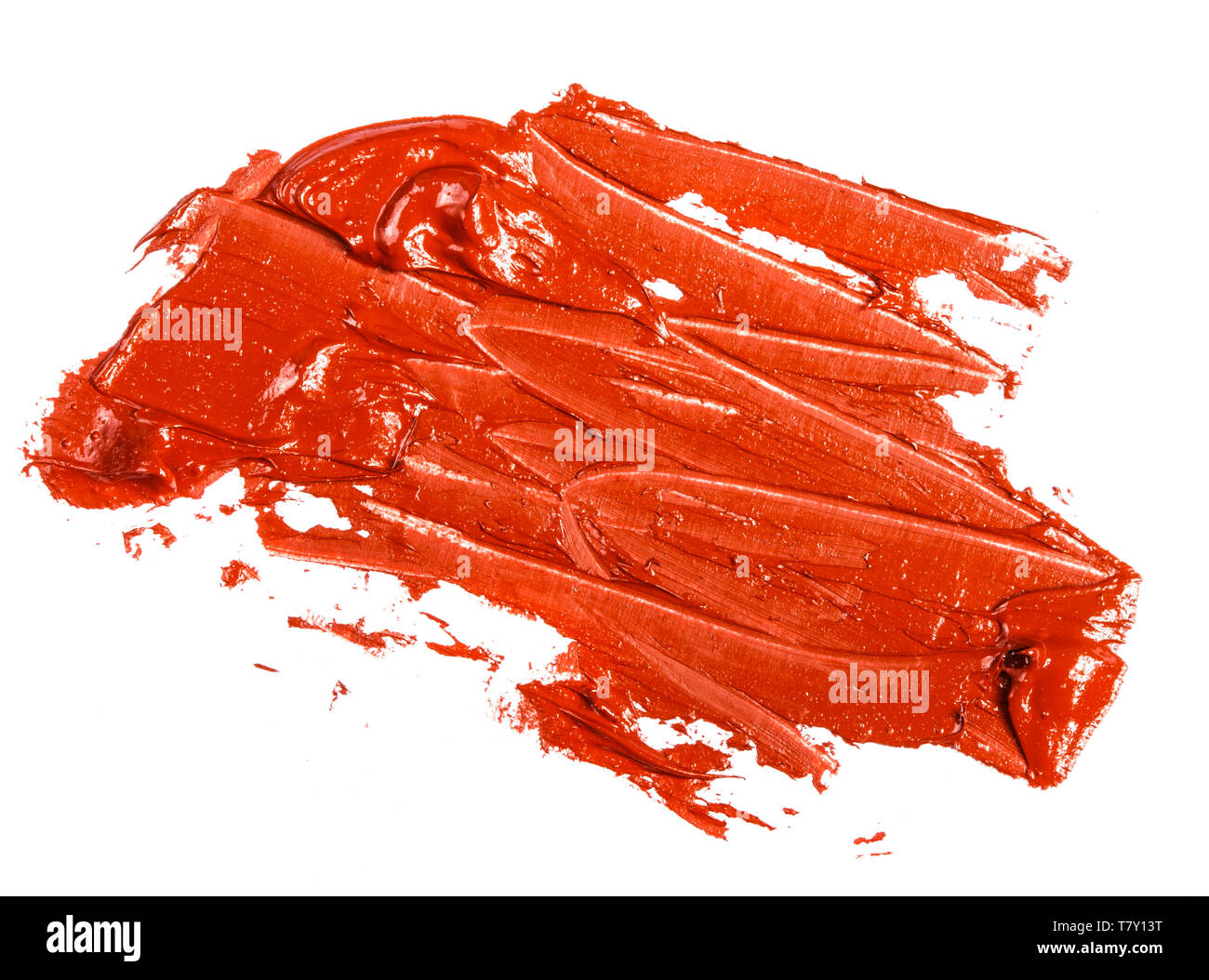 Makel der rot-orange Öl Farbe auf einer weißen Stockfoto