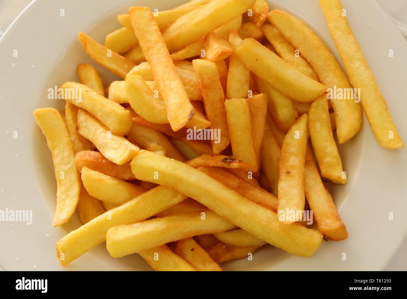 Platte von Pommes frites im Restaurant Stockfoto