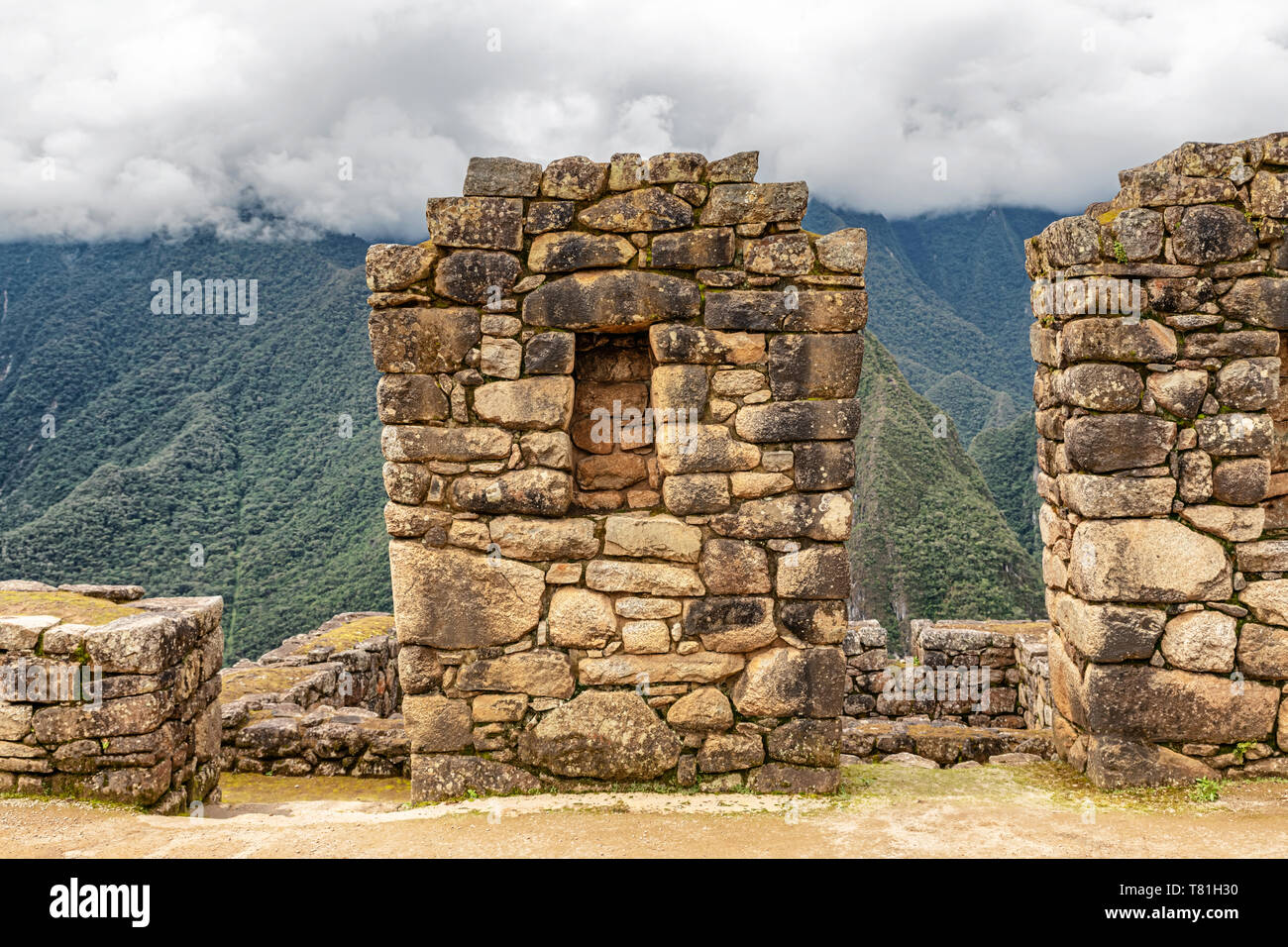 Gut erhaltenen Inca Gebäude und Häuser Strukturen, die in der antiken Stadt von Machu Picchu in Peru. Stockfoto
