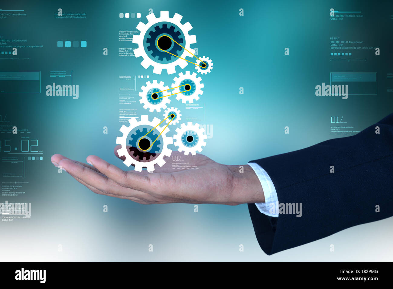 Business Mann mit Getriebetechnik Stockfoto