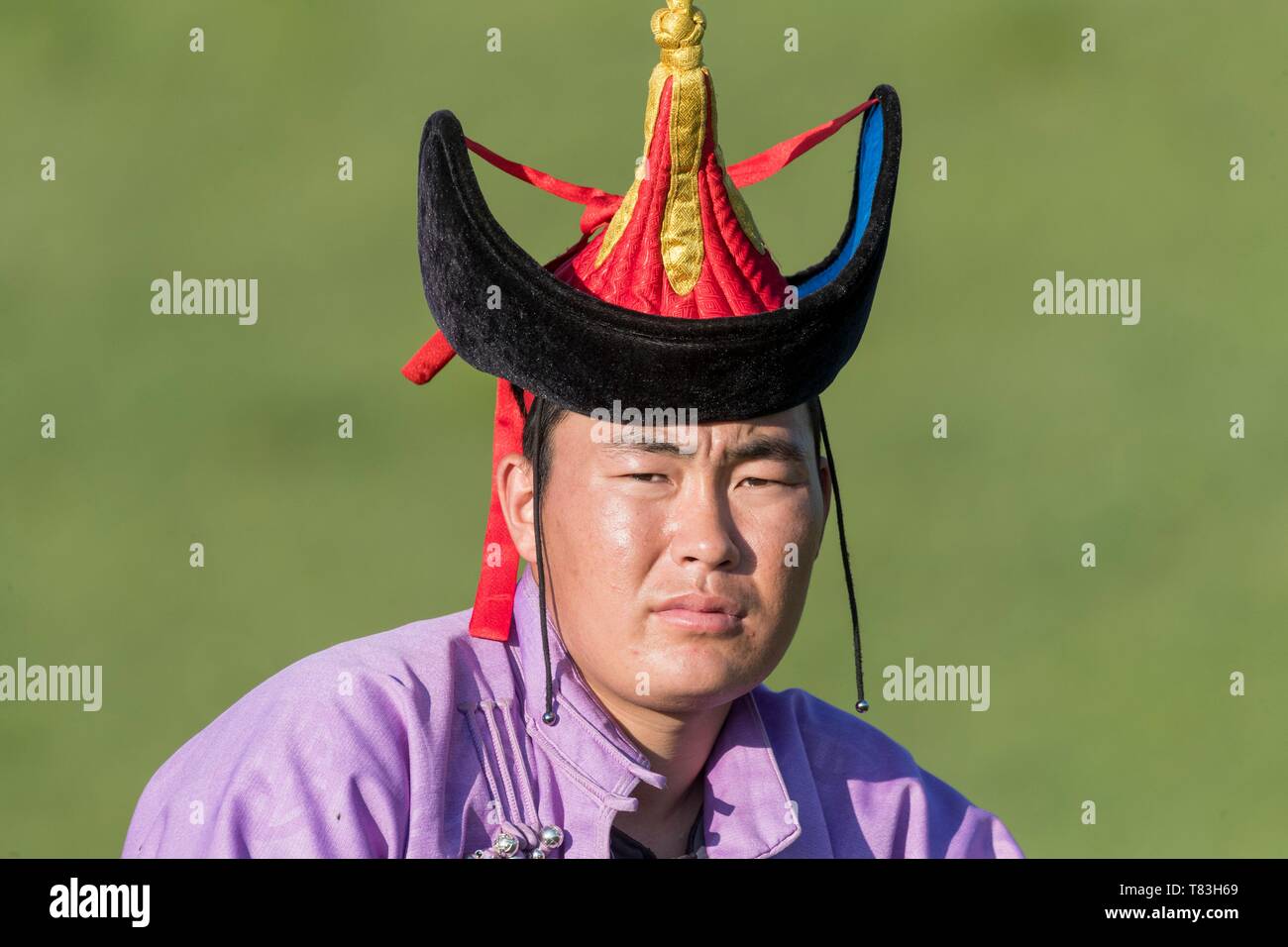 China, Innere Mongolei, Provinz Hebei, Zhangjiakou, Bashang Grünland, mongolische Mann traditionell gekleidet Stockfoto
