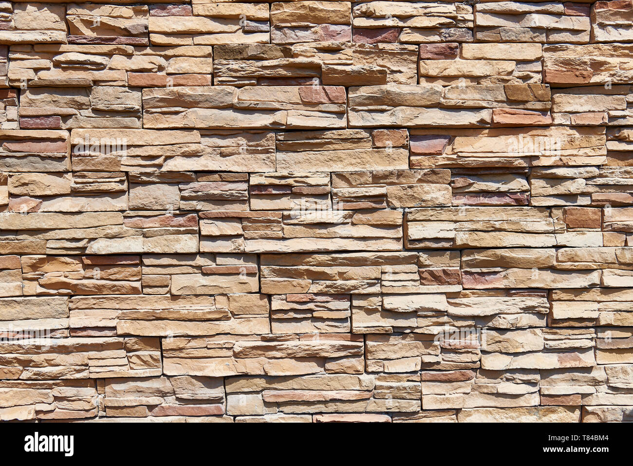 Gestapelte stein Wand Hintergrund horizontal. Stockfoto