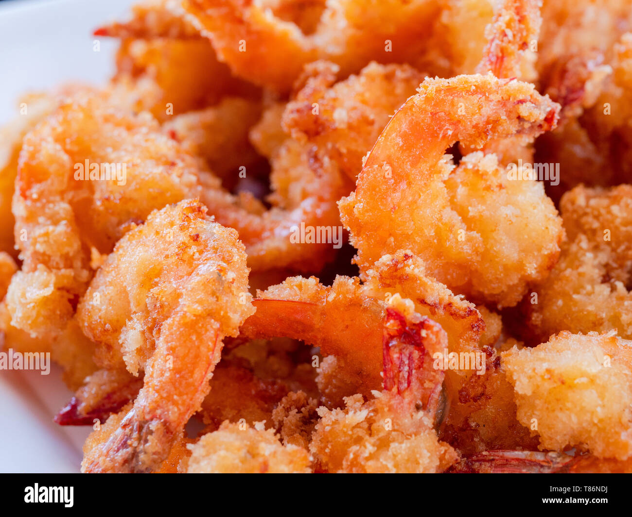 Filipino knusprig panierte Garnelen, camaron rebosado, eine köstliche und beliebte Speise in der Meeresfrüchte lieben, Philippinen. Geringe Tiefenschärfe. Stockfoto