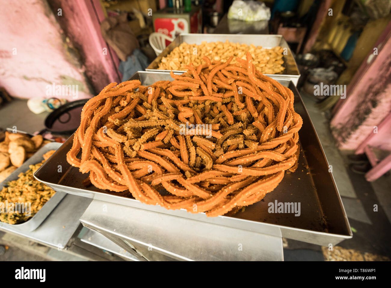 Murukku ist eine indische Snack mit Reis und schwarze Gramm Mehl gemacht. Stockfoto