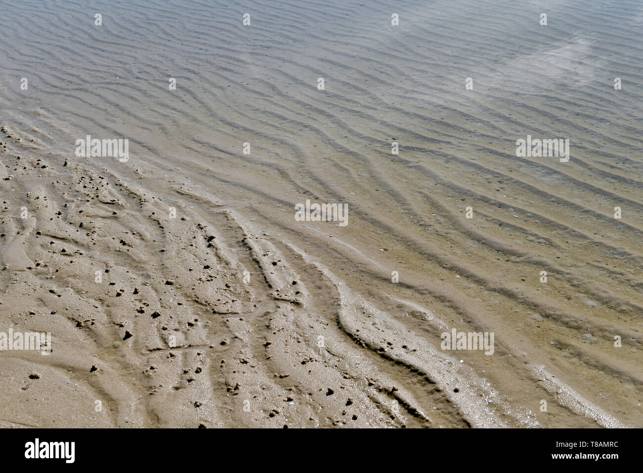 Strand Sand Textur. Sandstrand Meer für Hintergrund. Stockfoto